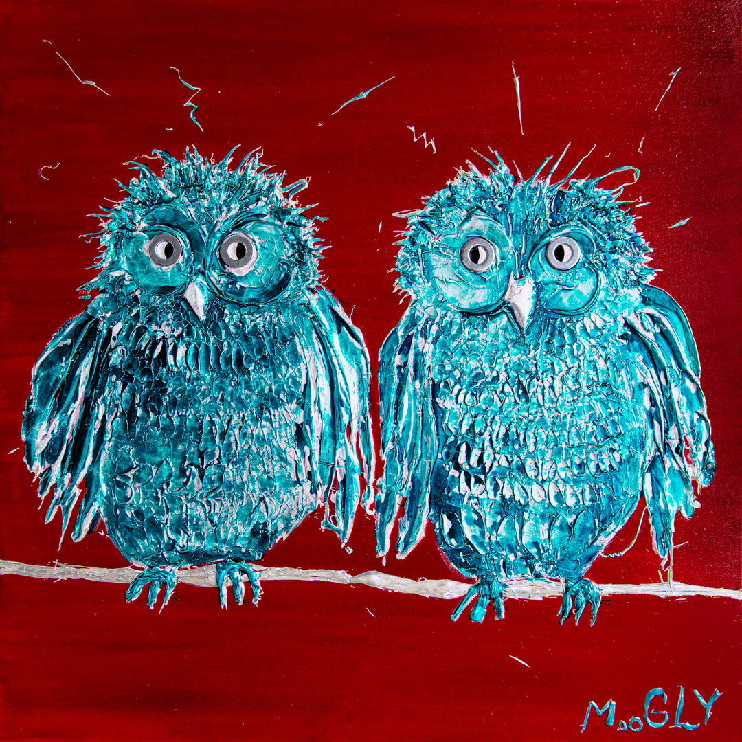 two blue birds sitting on branch with wide eyes on red background