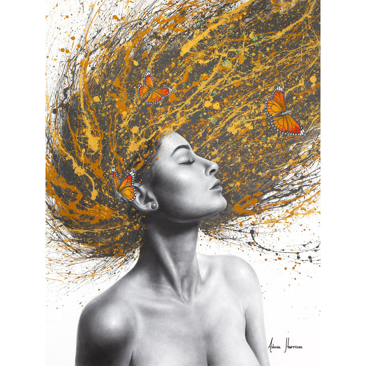 profile woman in black and white flipping hair over head in black yellow orange and gold splatter paint with orange monarch butterflies in hair on white background