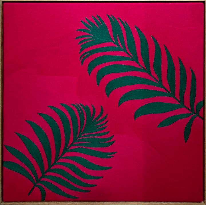 42.5"x42.5" chain-stitched textile with two tropical leafs over a bright pink background. 