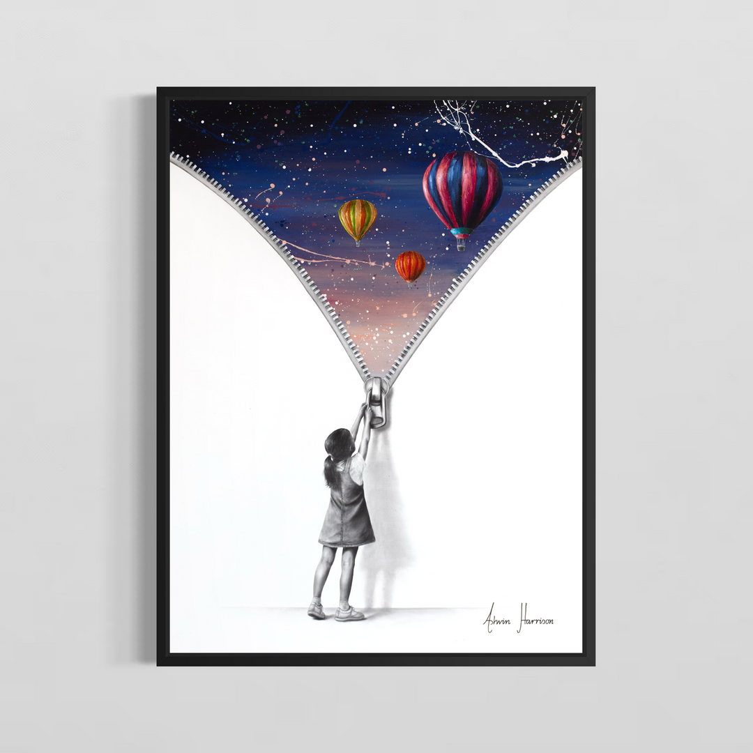Beyond The Wall Of Reality’ by Ashvin Harrison is a contemporary surrealist painting featuring a monochromatic young girl pulling down a large zipper to reveal a vibrant dreamlike sky filled with colorful hot air balloons, cosmic splatter effects, and deep blue twilight tones. Created with coconut charcoal dust and acrylic on canvas, this mixed-media artwork contrasts realistic grayscale portraiture with expressive abstract color, symbolizing imagination, wonder, and escape beyond reality
