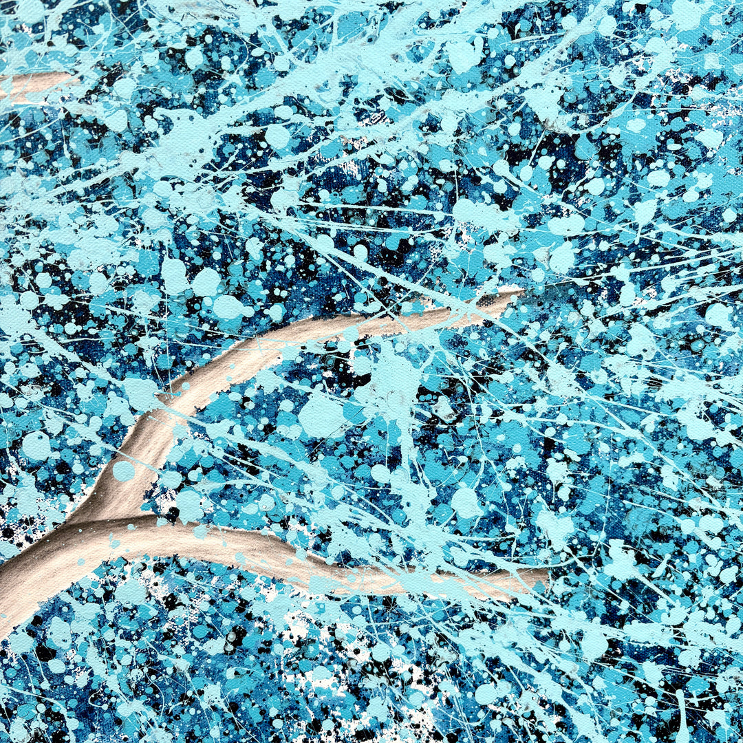 tree trunk and branches in black and white realistic with paint splattered blue expressionist abstract leaves acrylic in light blue and dark on white background