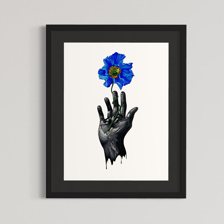 A dripping black hand holds out a vibrant blue poppy flower on a stark white background. The drips on the hand look like black oil, and the flower looks like it&