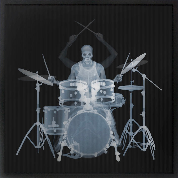 Framed Lenticular black and white x-ray photograph by Nick Veasey of a skeletal drummer 