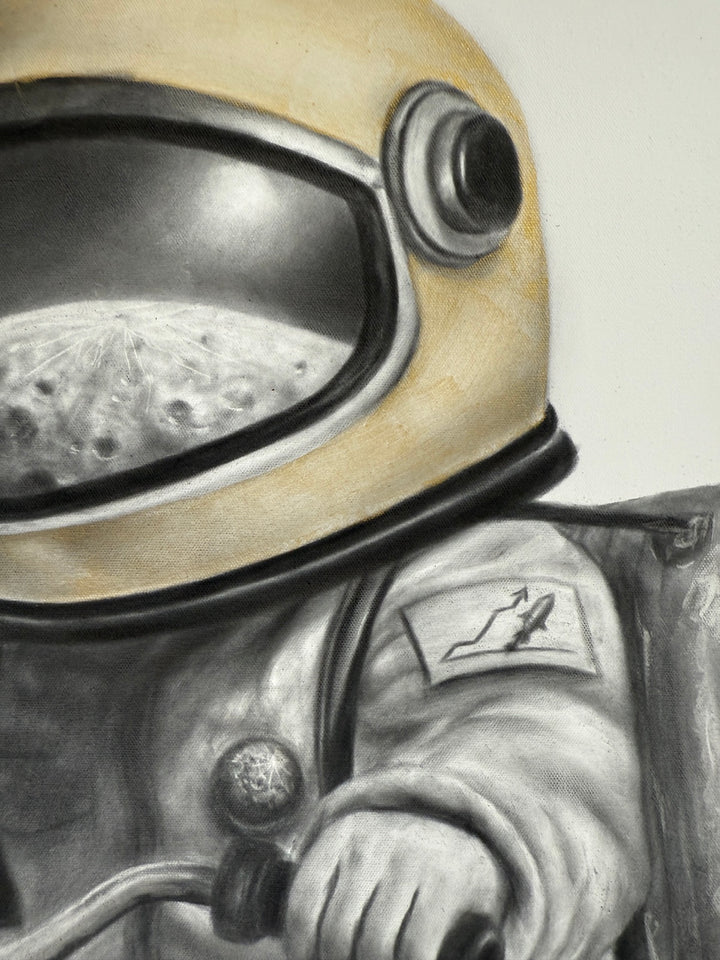 ‘Gallon Galaxy’ by Ashvin Harrison is a contemporary surrealist painting depicting a childlike astronaut riding a tricycle while carrying a fuel canister backpack and holding a balloon shaped like planet Earth. Rendered in coconut charcoal dust and acrylic on canvas, the artwork combines detailed monochromatic realism with vibrant cosmic color, expressive paint splatter techniques, and whimsical sci-fi imagery to evoke imagination, adventure, and environmental symbolism.