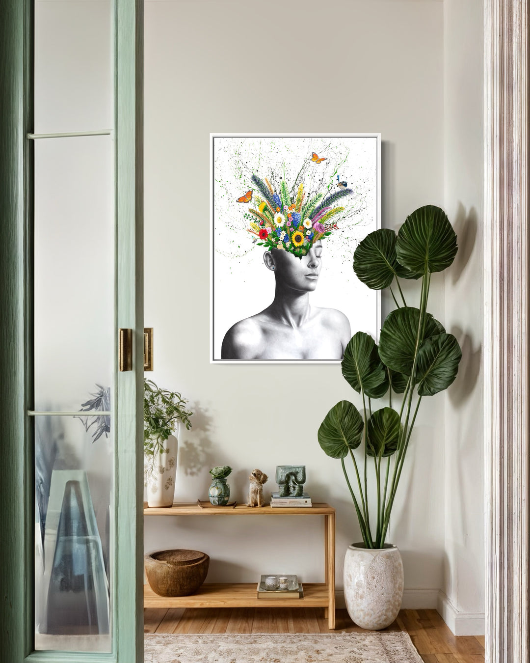 black and white woman figure head cracked open with plants leaves flowers butterflies bird bee coming out flying growing out of head and splatter paint on white background