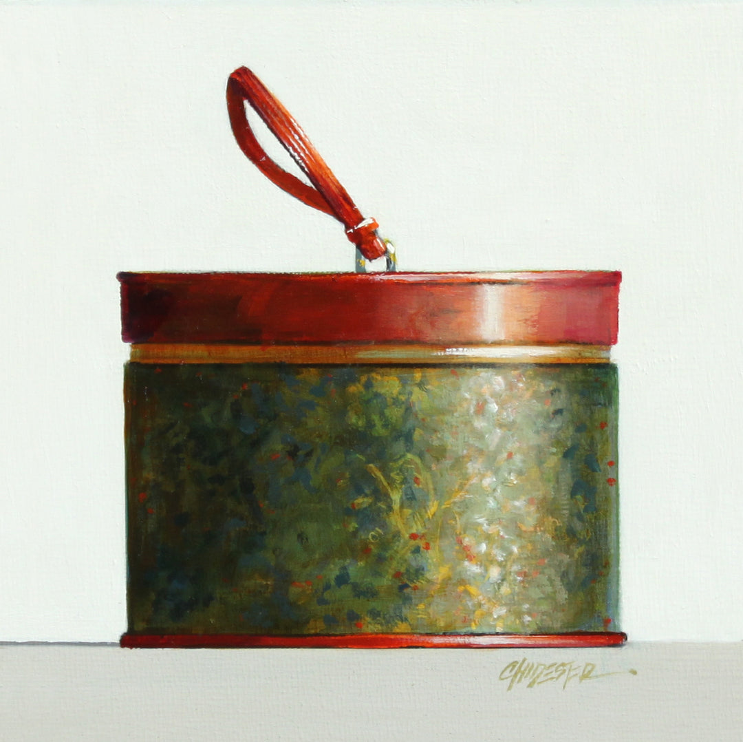 Realistic painting of a vintage green and red hat box. 6"X6" oil on canvas. Minimalist off white and grey background.