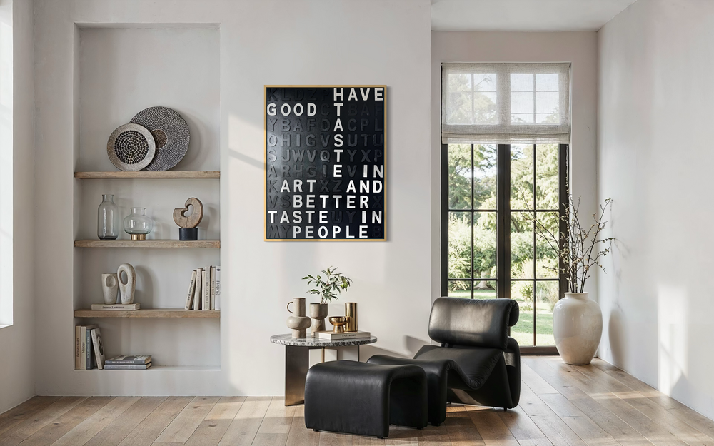 Steffanie Gerkin’s Have Good Taste Black 3D is a contemporary mixed-media typography artwork made with raised wood and acrylic letters on canvas, featuring a black monochrome alphabet grid with contrasting white letters that spell phrases including “Have Good Taste,” “Art,” “Better Taste,” and “People.”