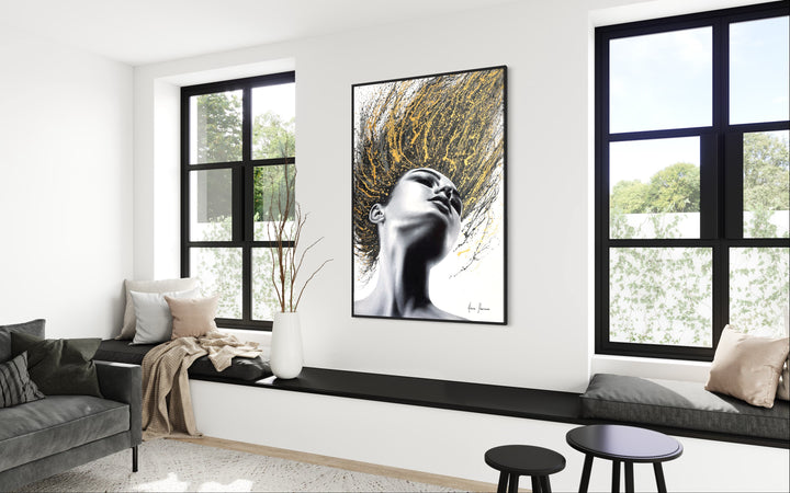 Woman flipping her hair, as golden and black paint splattered, high contrast painting