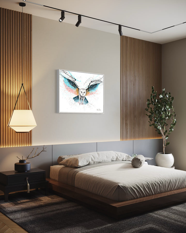 owl in black and white flying wings stretched out in blue pink and orange pastel color splatter paint on white background