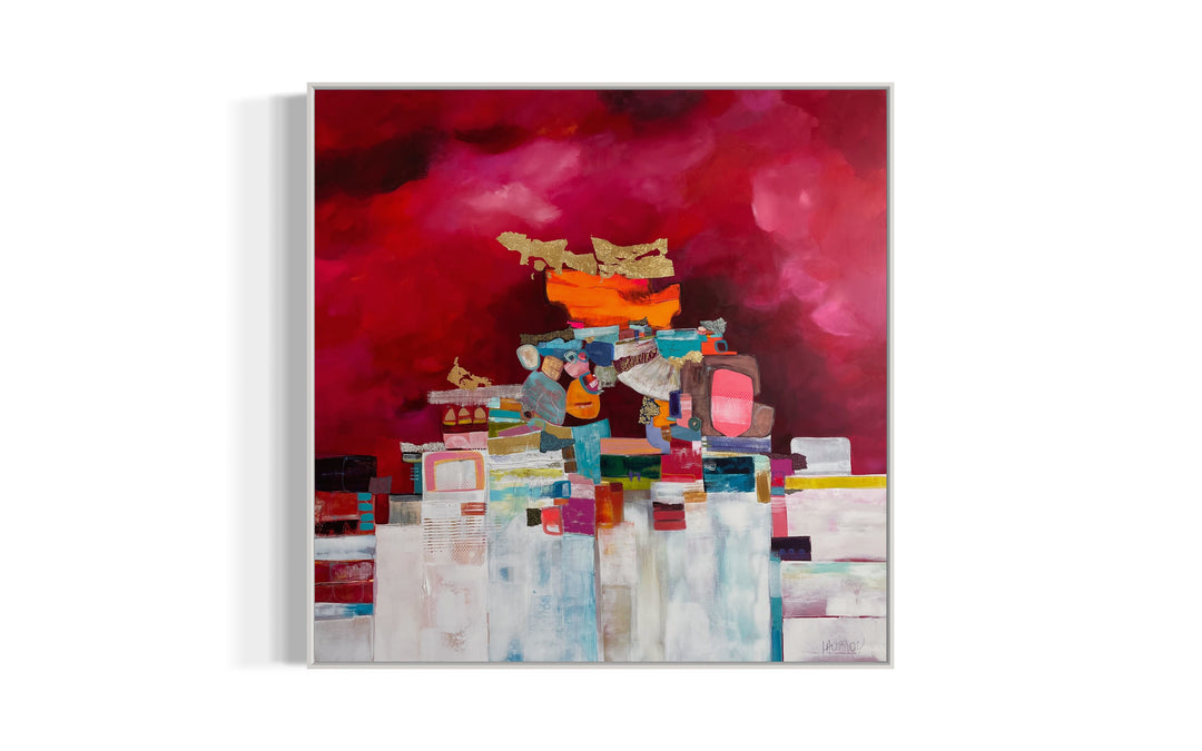 48" x 48" painting by Lau Blou, collaged pieces of torn and hand cut paper and fabrics with patterns and gold foil building up to triangular shape in middle of canvas on pink background with white on the bottom half
