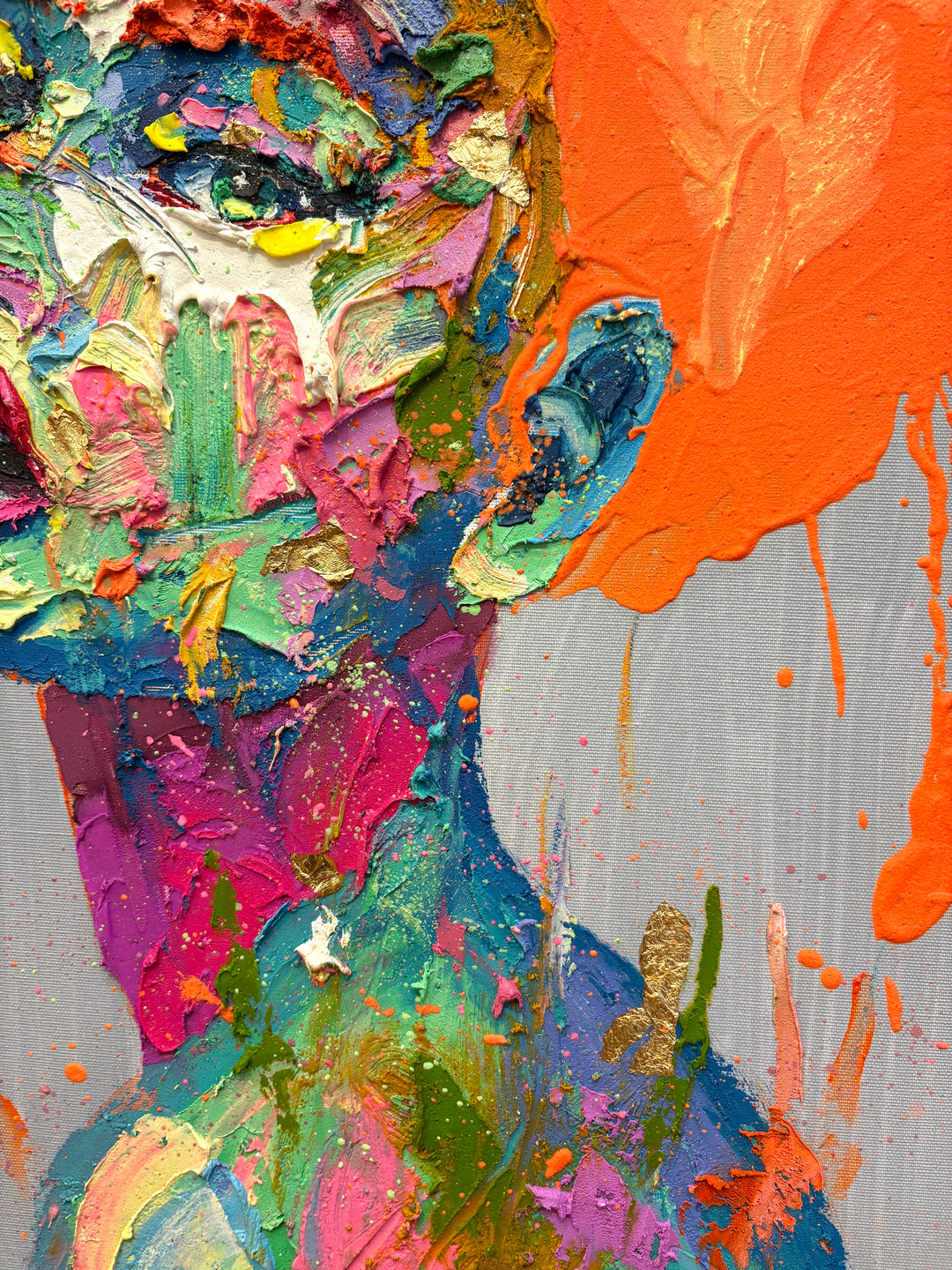 woman facing left with 3/4 profile view with skin made of thick layer of green pink red orange purple yellow impasto acrylic paint, with splattered orange hair on blue background
