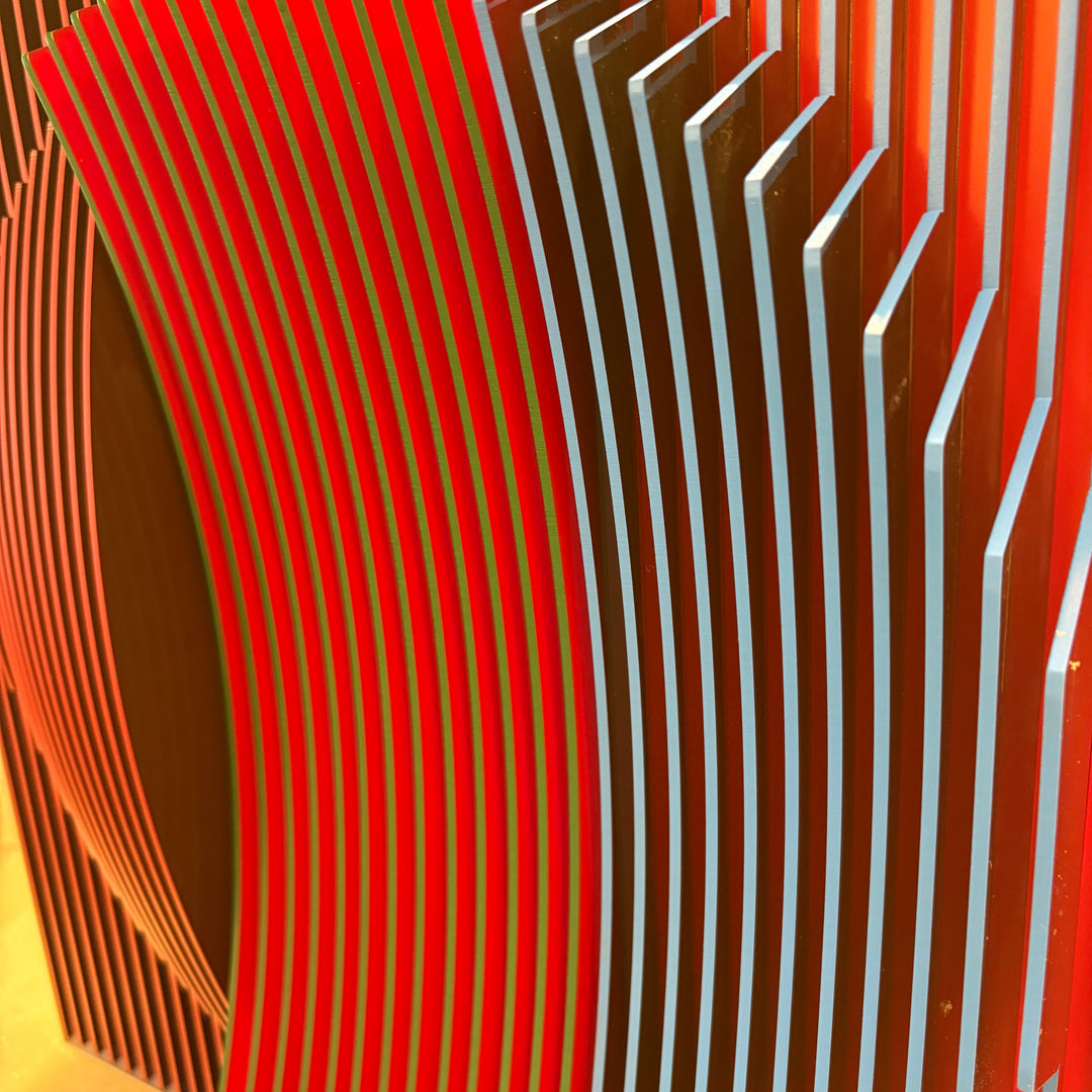 vertical stripes in three sections of color purple blue red optical mixing illusion concave convex sculptural abstract geometric modern