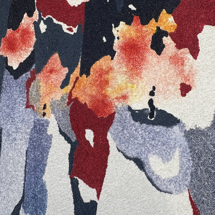 overabundance of lit flame candles taper sticks burning in blue red orange and yellow organic shapes negative space textured surface pumice and oil