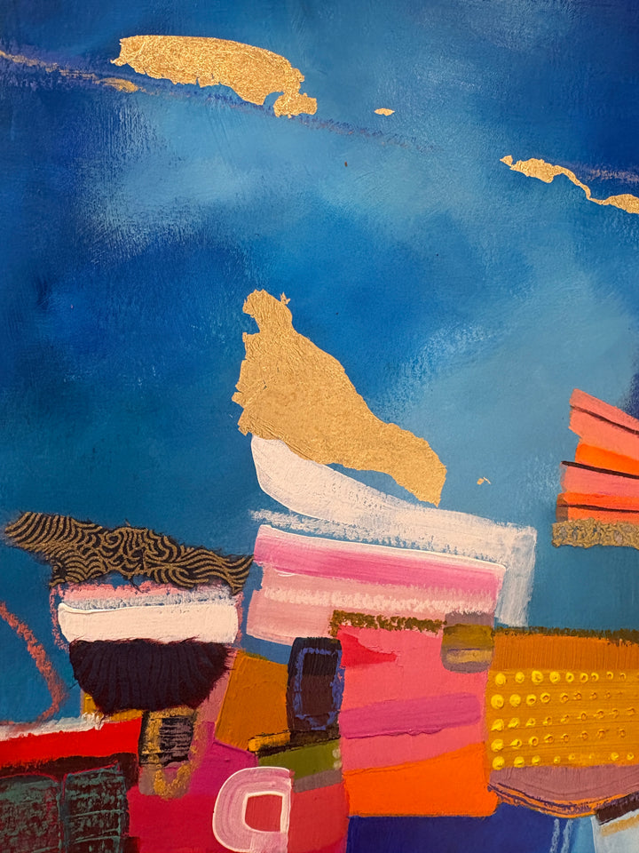 abstract colorful collage in paint graphite fabric patterns gold leaf stacked and over layed on bright blue background