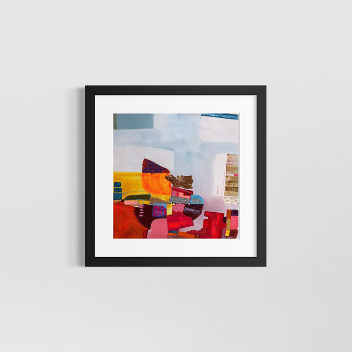 Lau Blou, L’élixir caché, acrylic paint, fabric, and gold leaf on canvas, 14 x 14 inches, shown in a white 17 x 17 inch mat and black frame on a light grey wall. Abstract painting of red, orange, and yellow blocks on pale blue.