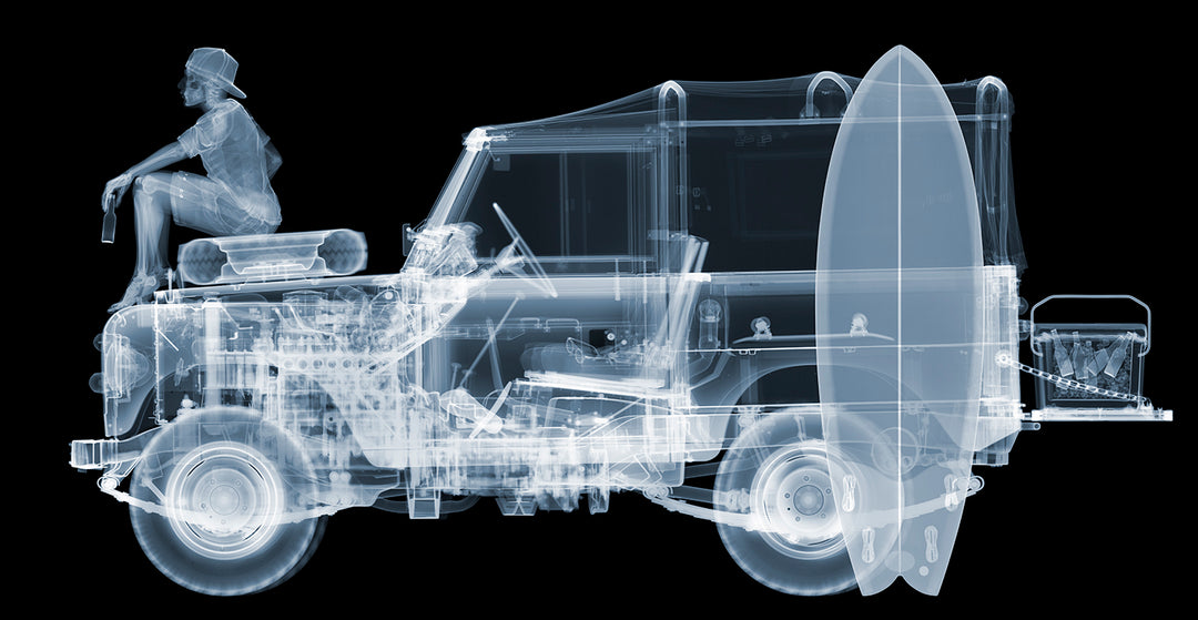x-ray skeleton car mechanical surfboard on black background