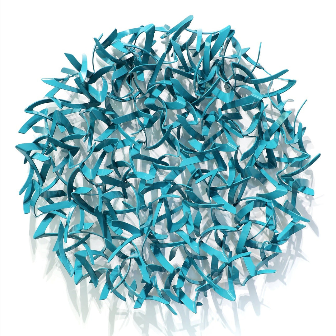 Matt Devine, Avian, powder-coated aluminum, made to order from 11 to 84 inches. Round wall sculpture of many small, curved turquoise aluminum pieces shaped like bird wings, interlocked in a dense cluster on a white wall.
