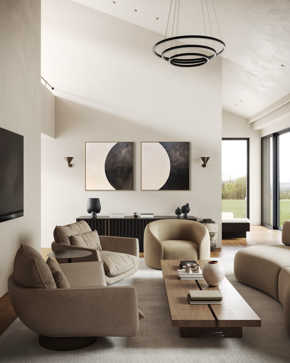 Lee in Cerulean, Monochrome Duo, joint compound and acrylic paint on canvas, 40 x 40 inches each (40 x 80 inches together). Two square black and cream textured panels, each with a large semicircle, hung side by side above a black sideboard in a living room with beige armchairs, a wood coffee table, and a tiered ring chandelier.