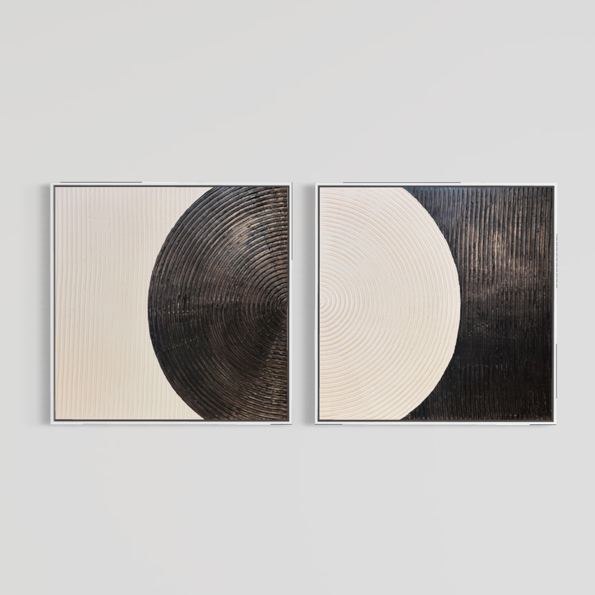 Lee in Cerulean, Monochrome Duo, joint compound and acrylic paint on canvas, 40 x 40 inches each (40 x 80 inches together). Two square black and cream textured panels, each in a thin white float frame, shown side by side on a light grey wall.