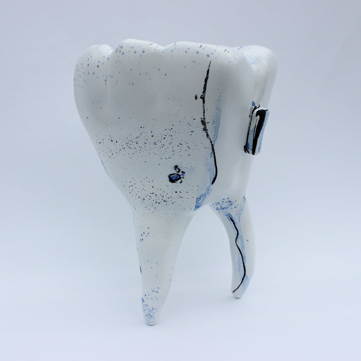 Mr. Molar (Or The Root of Evil)