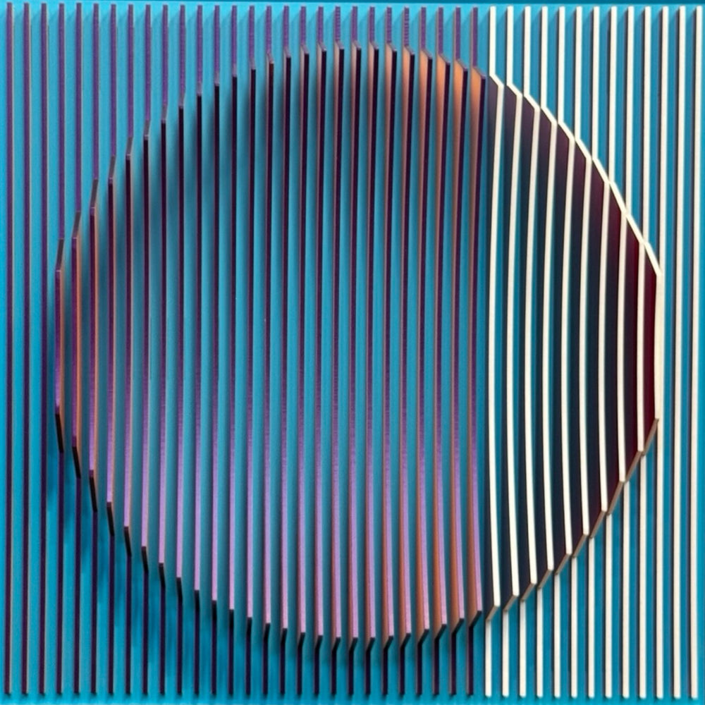 blue vertical 3 dimensional stripes with circular shape in center optical illusion convex concave sculpture when viewed straight on blue when turned to side orange