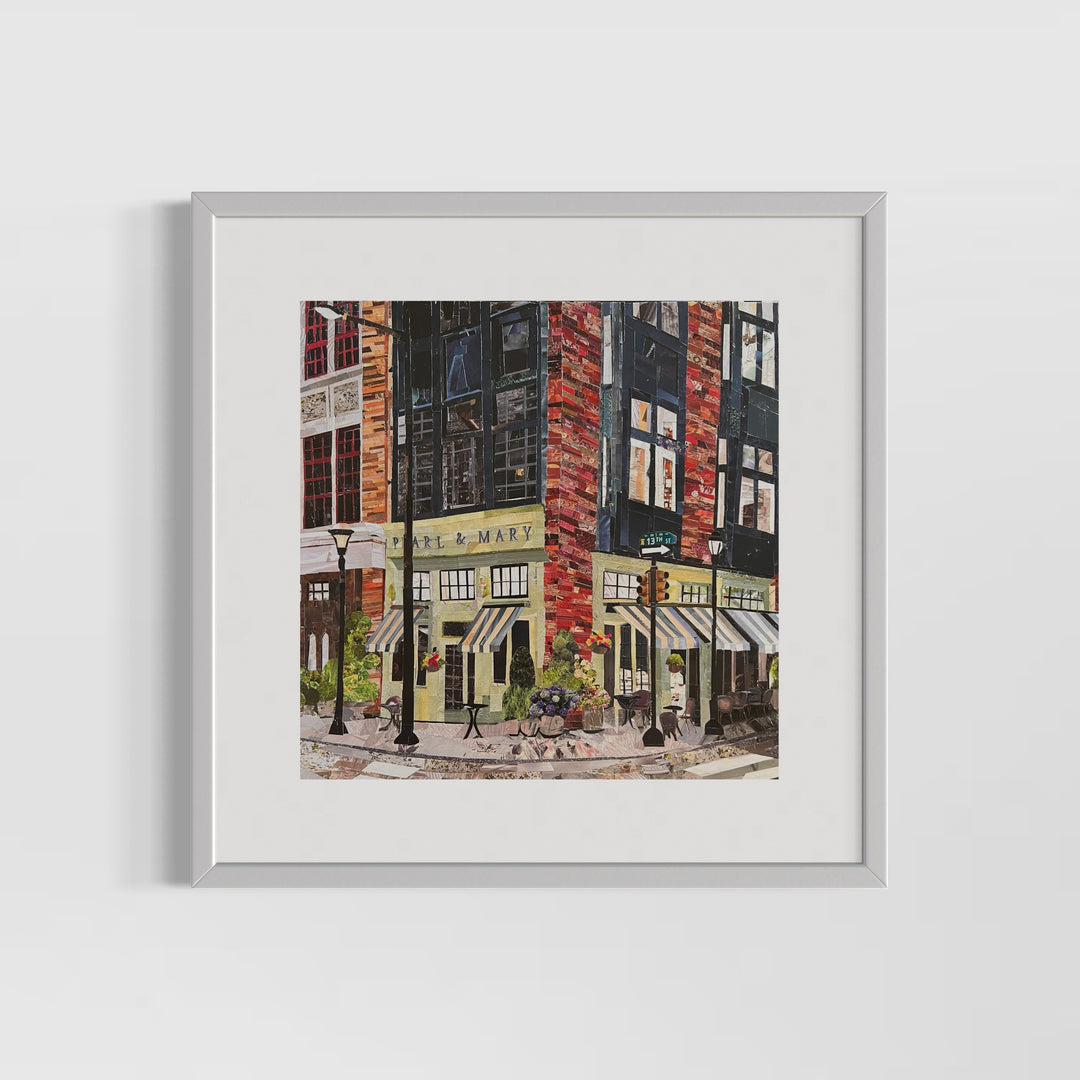 17" x 17" matted torn paper collage artwork by Chrissy McIntyre. Art of Pearl and Mary Oyster Bar in Philadelphia, view of street corner with signs and lampposts, done in yellow, black and red.