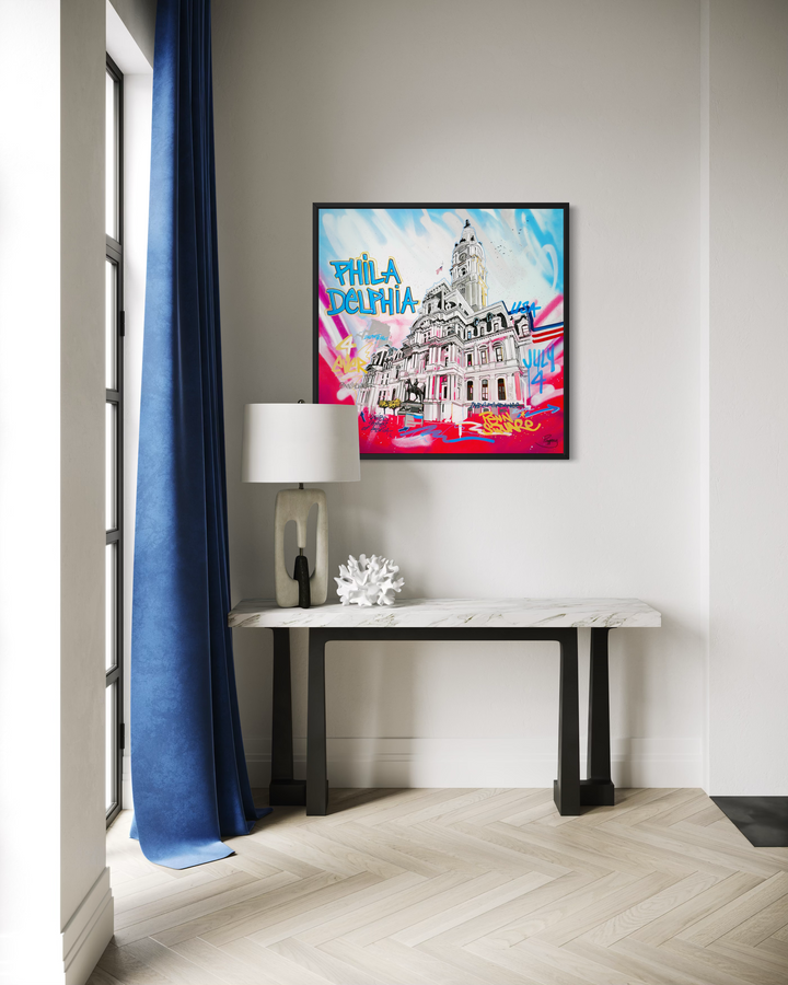 "Penn Square" by Pappay — a vibrant street art-inspired painting on canvas depicting Philadelphia City Hall surrounded by explosive neon pink, blue, and red graffiti lettering reading "Philadelphia," "Penn Square," "July 4," and "USA" against a vivid spray-painted background. A bold, energetic celebration of Philadelphia&