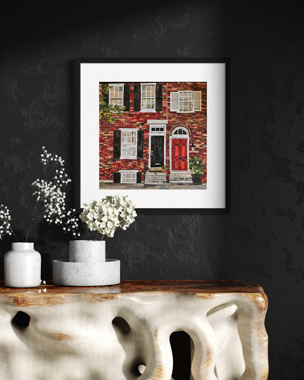 17" x 17" torn paper collage on canvas by Chrissy McIntyre. Artwork of red brick rowhomes in Philadelphia, featuring window panels and stoops.