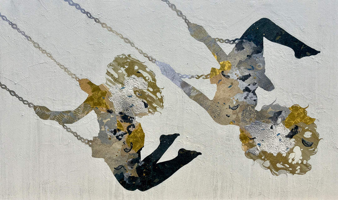Swinging Silhouettes II by Christopher Peter. Wide-format mixed media painting of two female figures on chains, their silhouettes filled with gold, silver, and taupe patterned collage papers against a soft white-gray canvas.