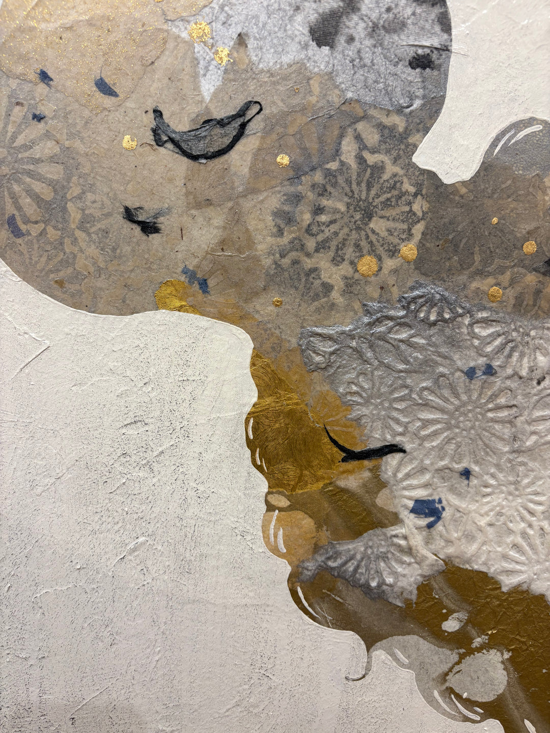 Close-up detail of Swinging Silhouettes II showing a figure&