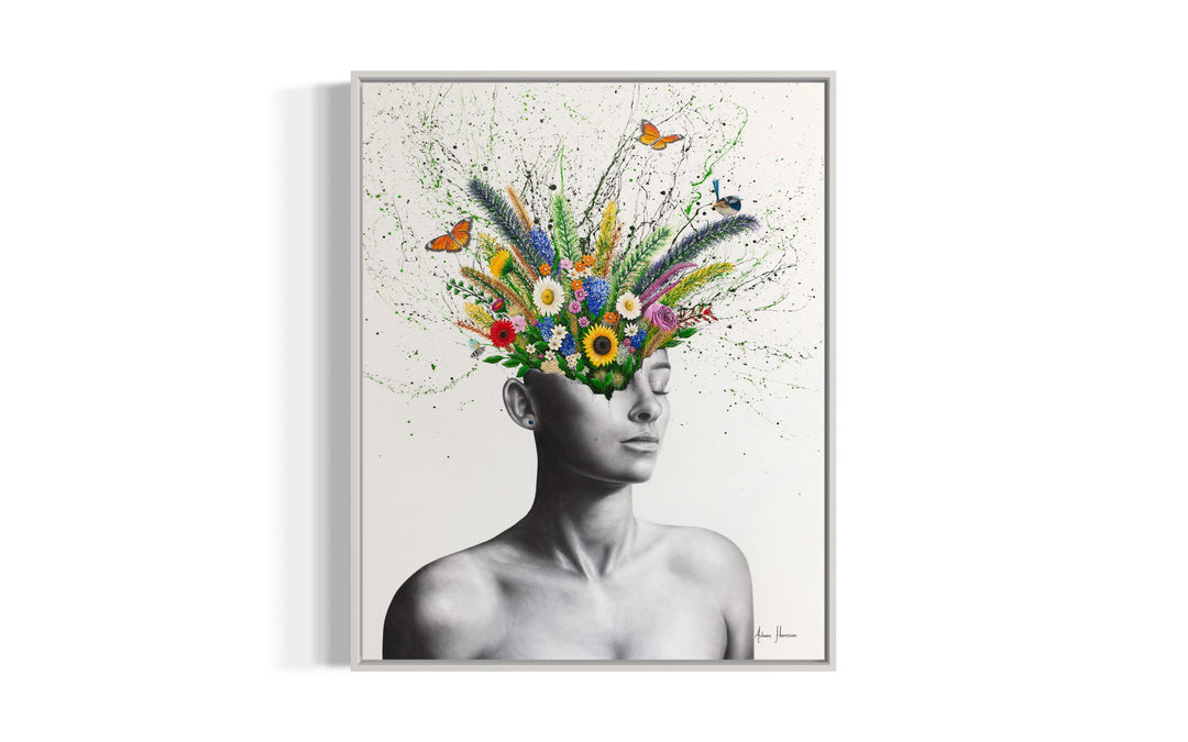 black and white woman figure face shattered with plants flowers and butterflies and bird growing and coming out of head splatter paint in background on white background