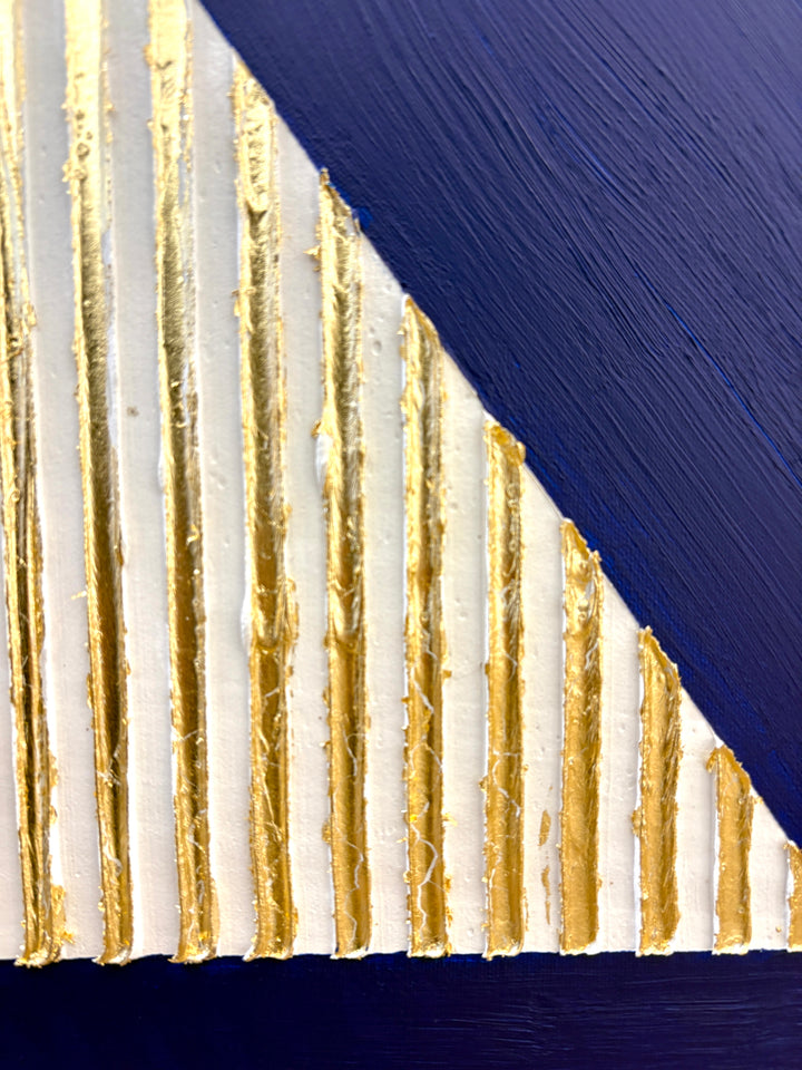minimal geometric abstract sculptural work with joint compound texture dimension white rigid triangle with gold leaf detail on blue background