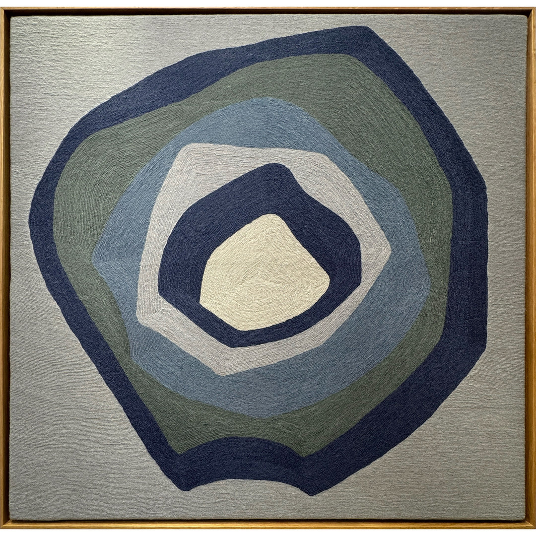 43"x42.5" chain-stitched textile with blue hues in a geometric form. 