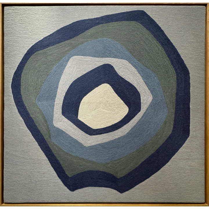43"x42.5" chain-stitched textile with blue hues in a geometric form. 