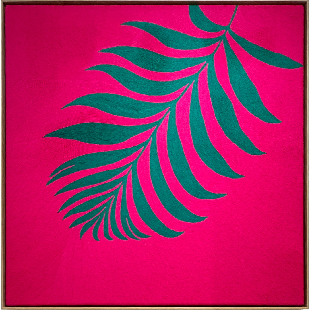 42.5"x42.5" chain-stitched textile with a tropical leaf over a bright pink background. 