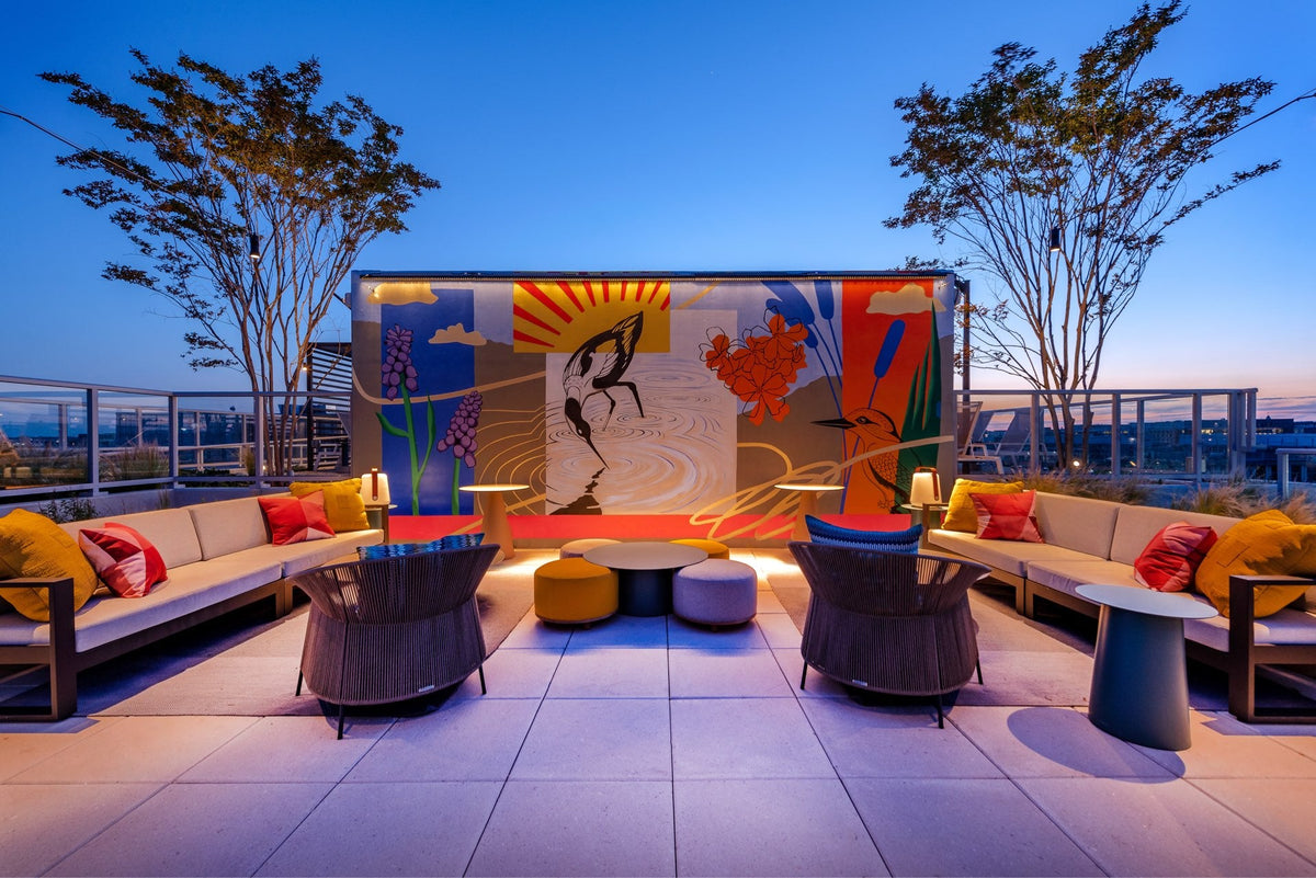 Custom rooftop mural of birds and botanicals at the Gallery 64 luxury residential lounge, an art advisory project by Morton Contemporary