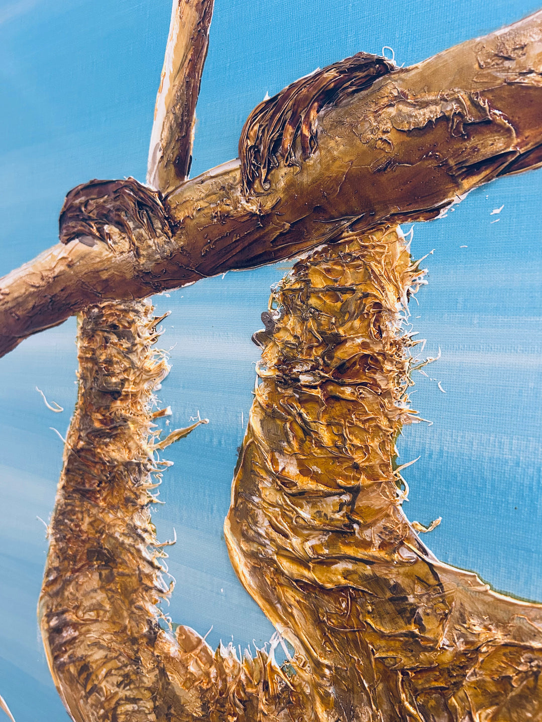 36" x 36" acrylic on canvas painting of a beige sloth hanging from a branch with a coca cola over a blue gradient background. 