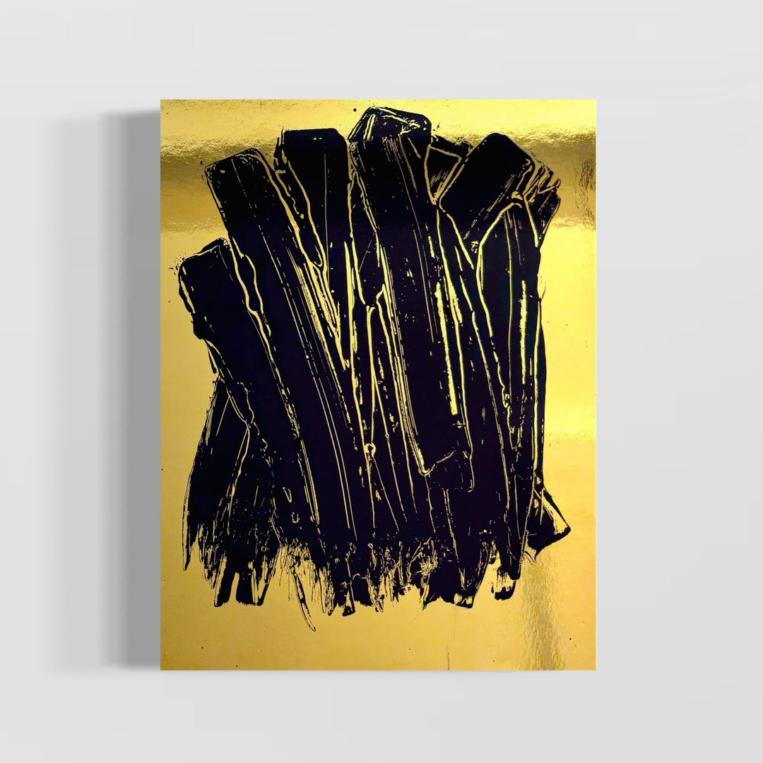 expressionistic long swatches of black paint vertically on shiny reflective smooth gold surface by artist m clark