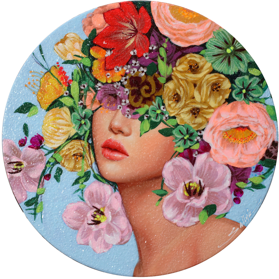 White woman profile with flowers on her head covering her eyes in pinks purples reds and green on blue background