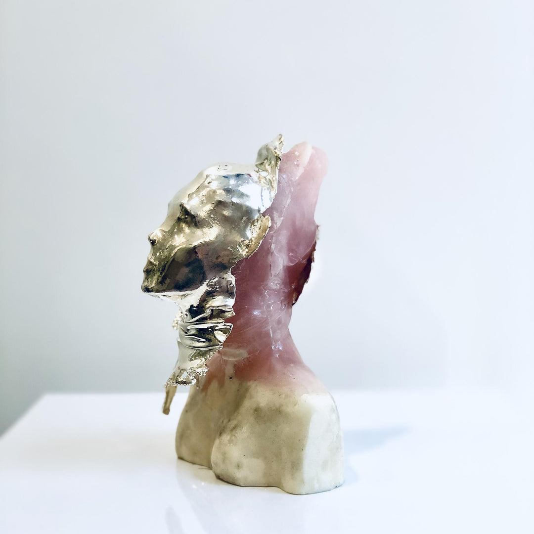 Girl With Mask, sculpture by Michal Cimala. Polyester resin and galvanized silver with polyurethane. 4.75 by 3.25 by 2.5 inches.