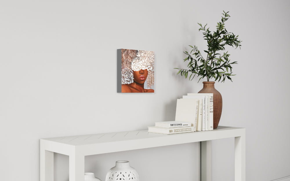 Silver, artwork by Sally K., displayed in a home. Acrylic paint and silver leaf on canvas. 12 by 12 inches.