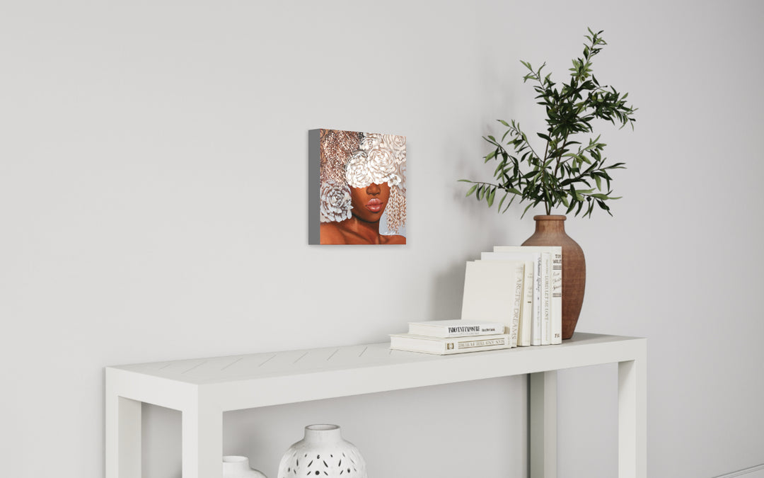 Silver, artwork by Sally K., displayed in a home. Acrylic paint and silver leaf on canvas. 12 by 12 inches.